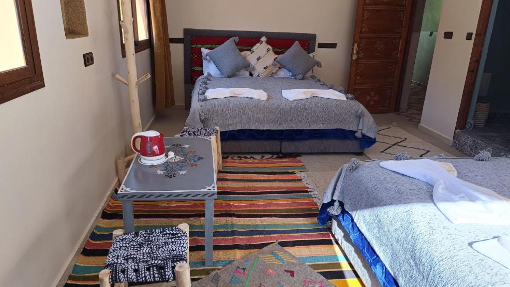 Postel nebo postele na pokoji v ubytování Riad otos views