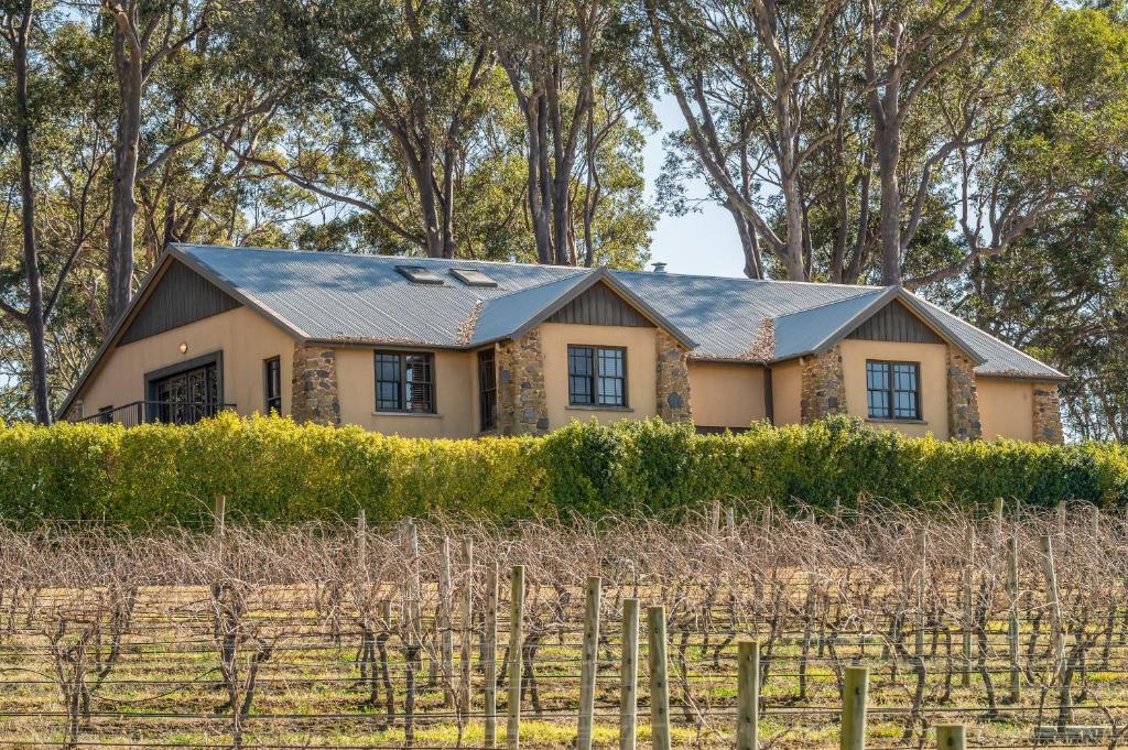 a house in the middle of a vineyard at Bonvilla Estate in Pokolbin