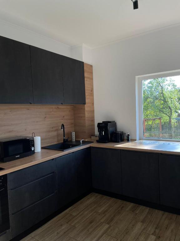 Kuchyň nebo kuchyňský kout v ubytování Private Chalet