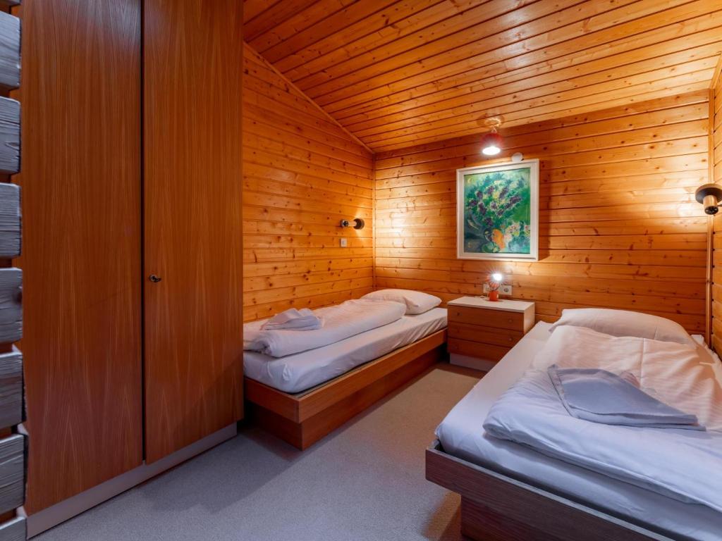 Postel nebo postele na pokoji v ubytování Jungfrau