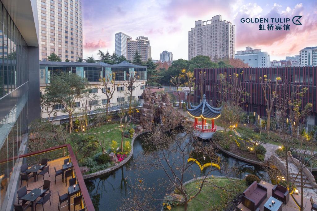 a rendering of a garden in a city at Golden Tulip Shanghai Hongqiao - A Louvre Hotel in Shanghai