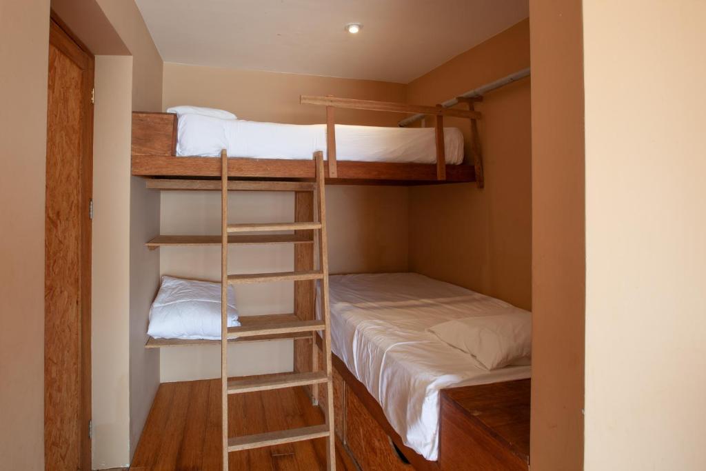 Postel nebo postele na pokoji v ubytování Alma Loft