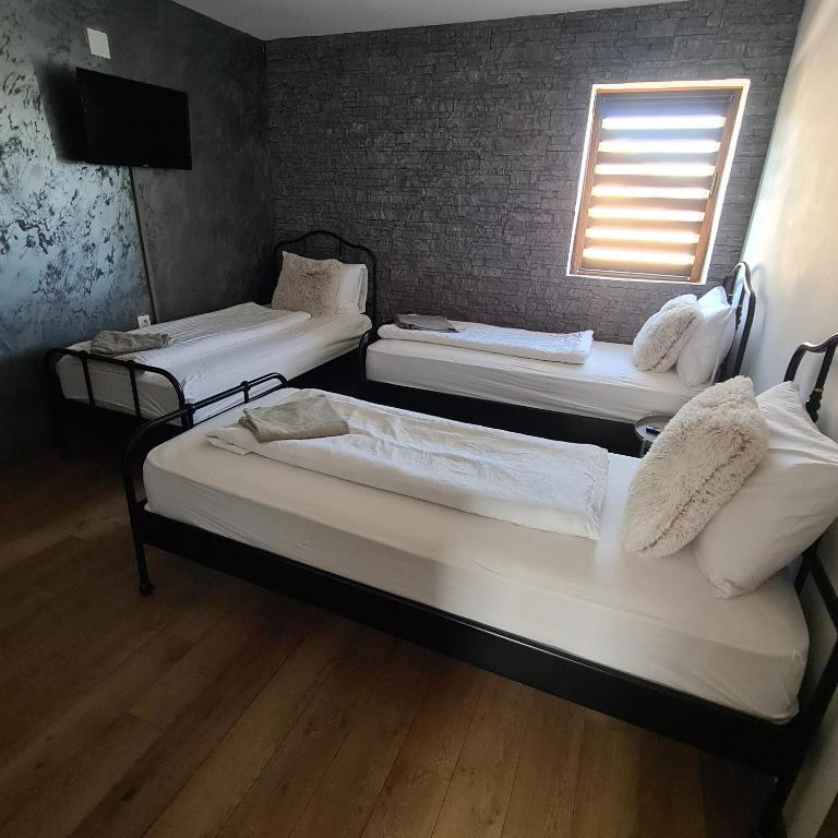 Postel nebo postele na pokoji v ubytování Vila Estera Therme Balotesti