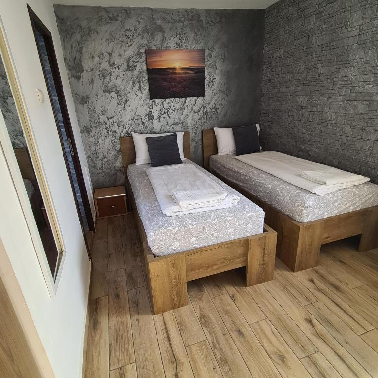 Postel nebo postele na pokoji v ubytování Vila Estera Therme Balotesti