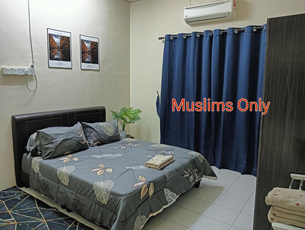 Katil atau katil-katil dalam bilik di Homestay Itqan Seri Iskandar