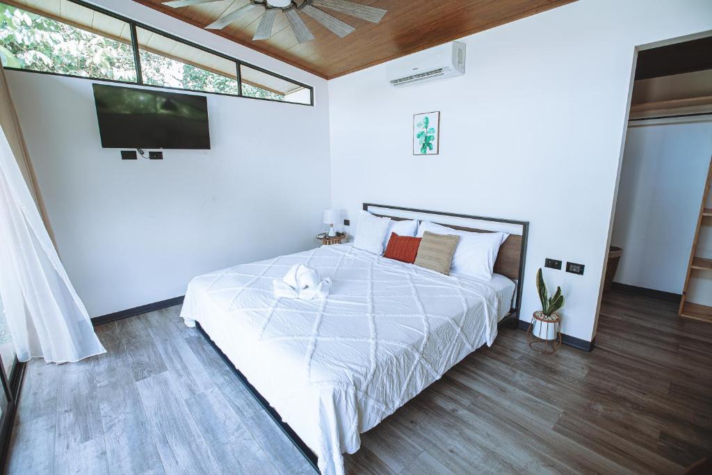 Postel nebo postele na pokoji v ubytování Natura Bungalows