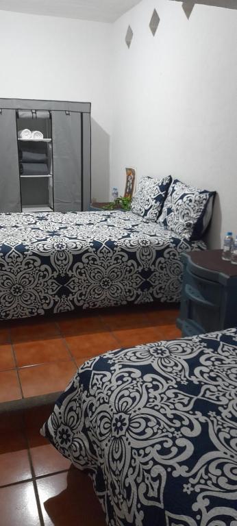 Letto o letti in una camera di Casa Sauces