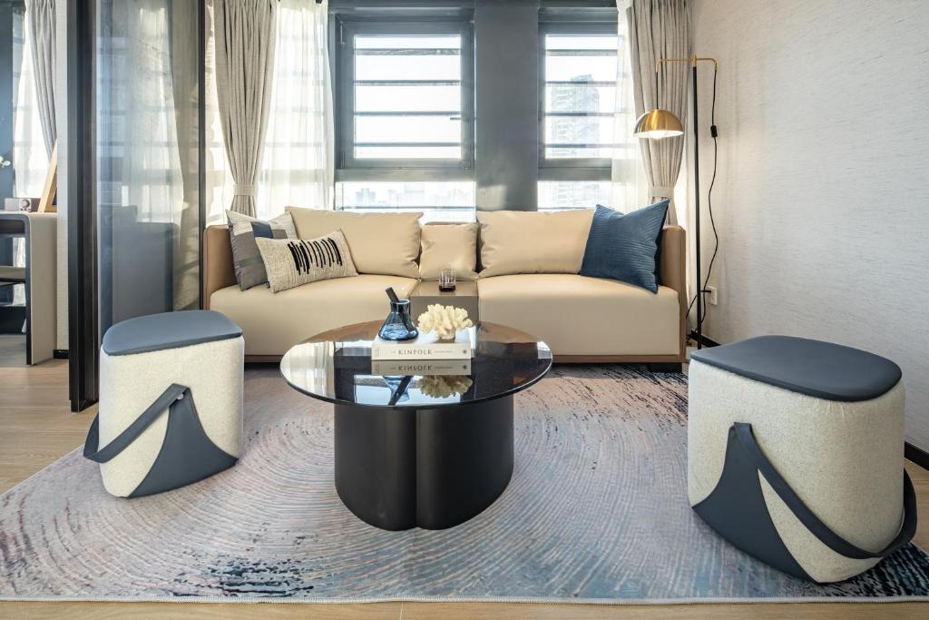 Posezení v ubytování BORUISI Executive Apartment