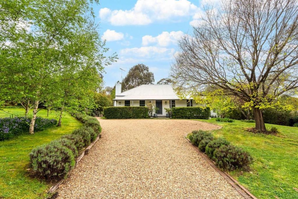 a driveway leading to a white house at Somerset, Berrima, Southern Highlands in Berrima