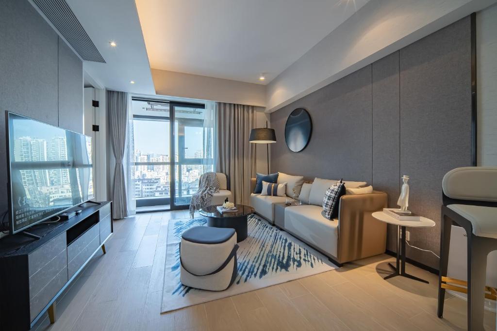 TV a/nebo společenská místnost v ubytování BORUISI Executive Apartment