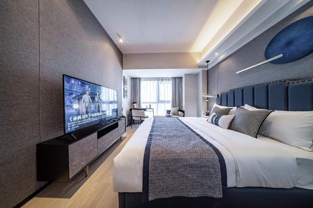 TV a/nebo společenská místnost v ubytování BORUISI Executive Apartment