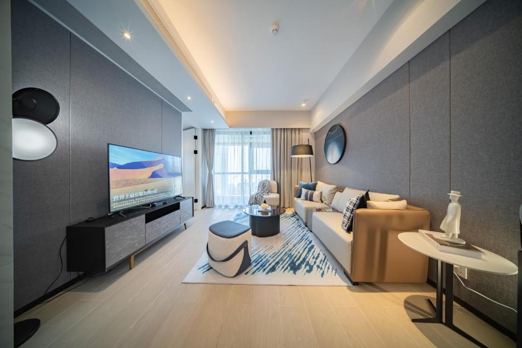 TV a/nebo společenská místnost v ubytování BORUISI Executive Apartment