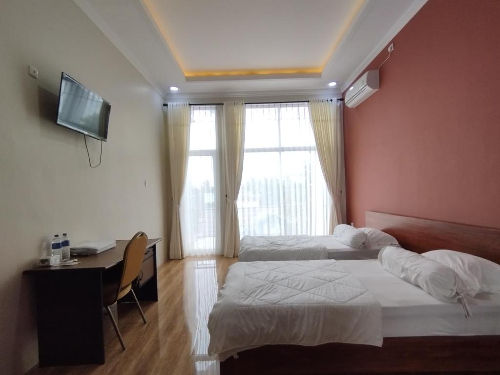 Saira Hotel dan Homestay Syariah - Deluxe Çift Kişilik Oda - Balkonlu