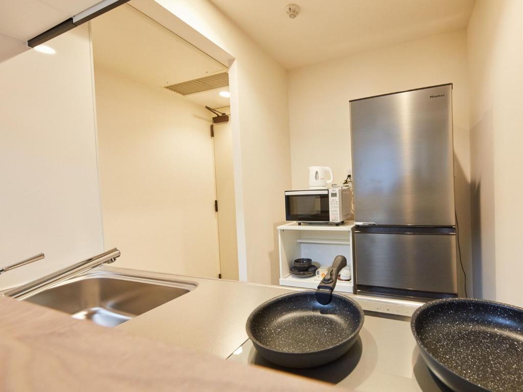 Kuchyň nebo kuchyňský kout v ubytování Rembrandt Hotel Atsugi