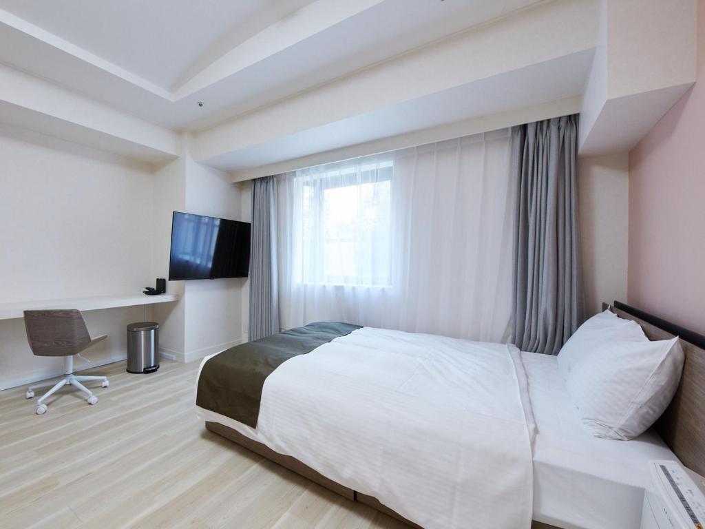 TV a/nebo společenská místnost v ubytování Rembrandt Hotel Atsugi