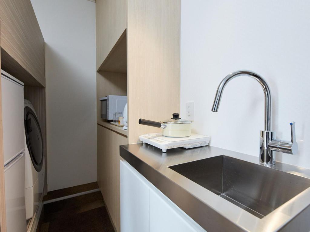 Kuchyň nebo kuchyňský kout v ubytování Rembrandt Hotel Atsugi