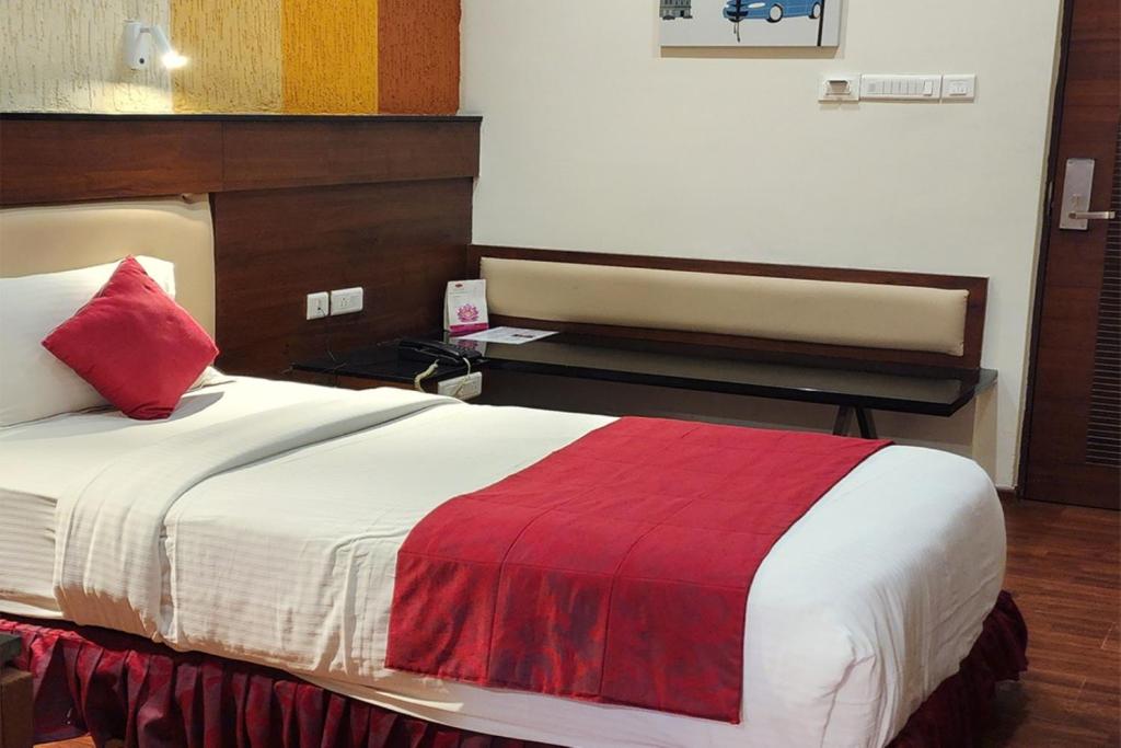 Postel nebo postele na pokoji v ubytování Hotel High Point