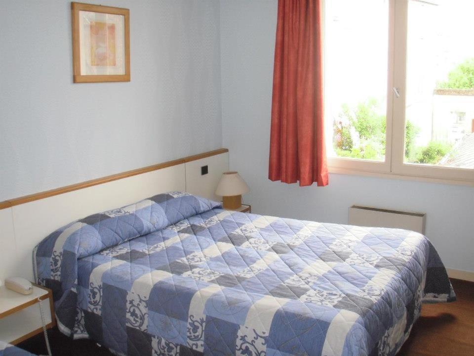 Postel nebo postele na pokoji v ubytování Jackotel
