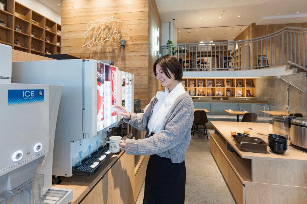 ホテルリリーフ小倉Annexにあるキッチンまたは簡易キッチン