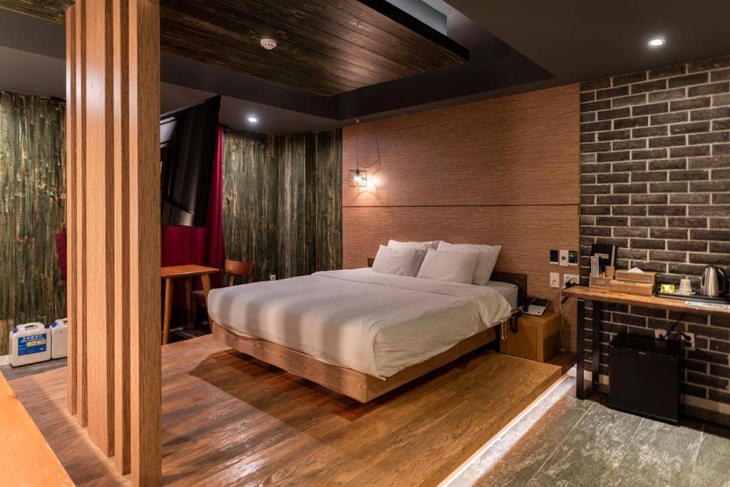 Postel nebo postele na pokoji v ubytování 해운대 109 호텔 부산 Hotel 109 Busan Haeundae