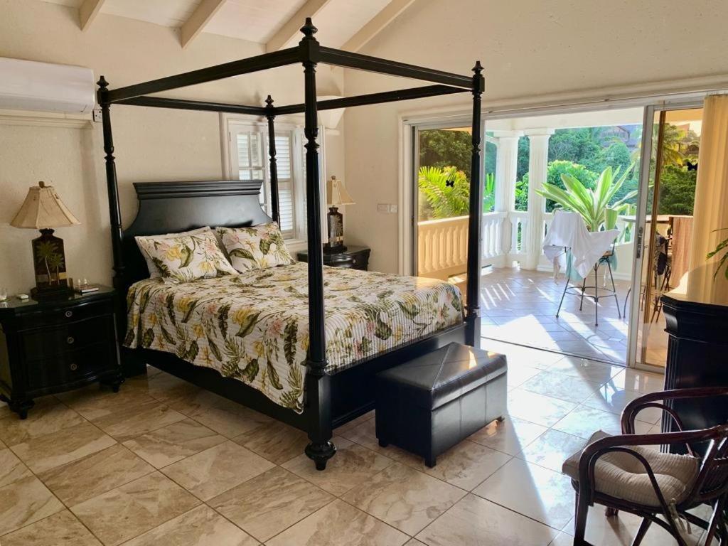 Кровать или кровати в номере Villa Ashiana - Beautiful 3-bedroom villa in Marigot Bay villa