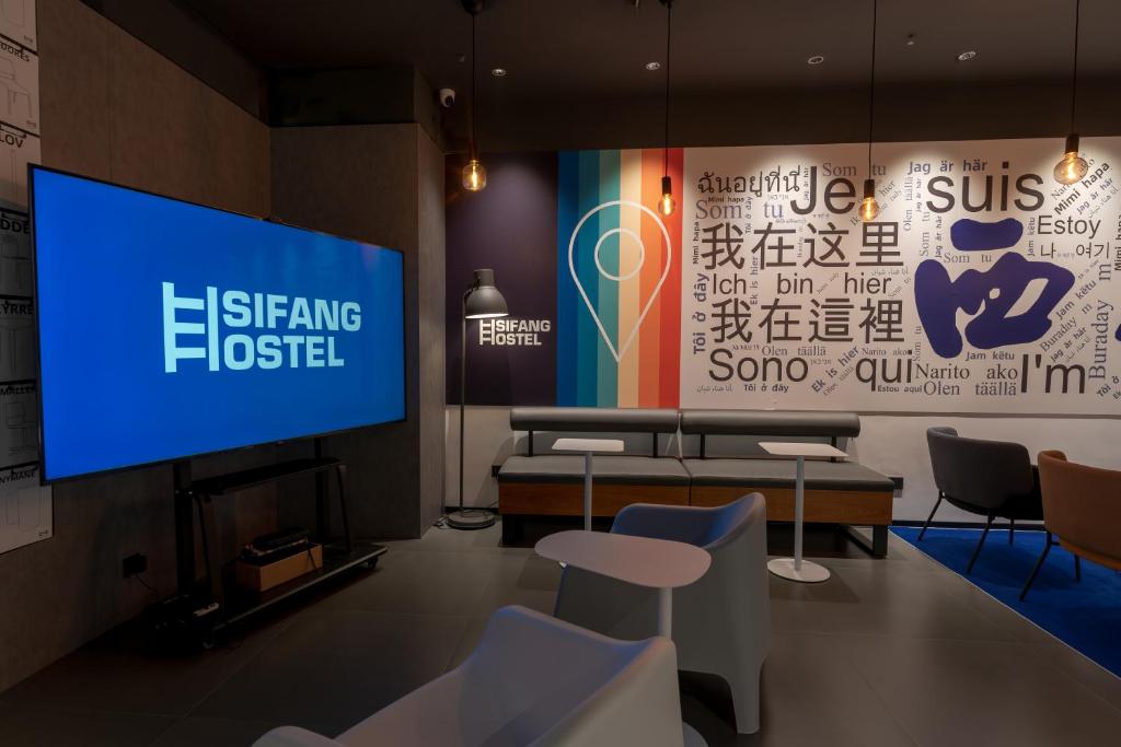 TV a/nebo společenská místnost v ubytování Sifang Space Hostel Xi'an - Xi'an KEJIDAXUE metro Line4