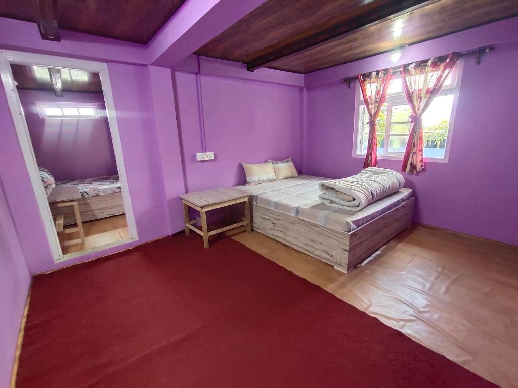Voodi või voodid majutusasutuse Boho Homestay, Rangbhang toas