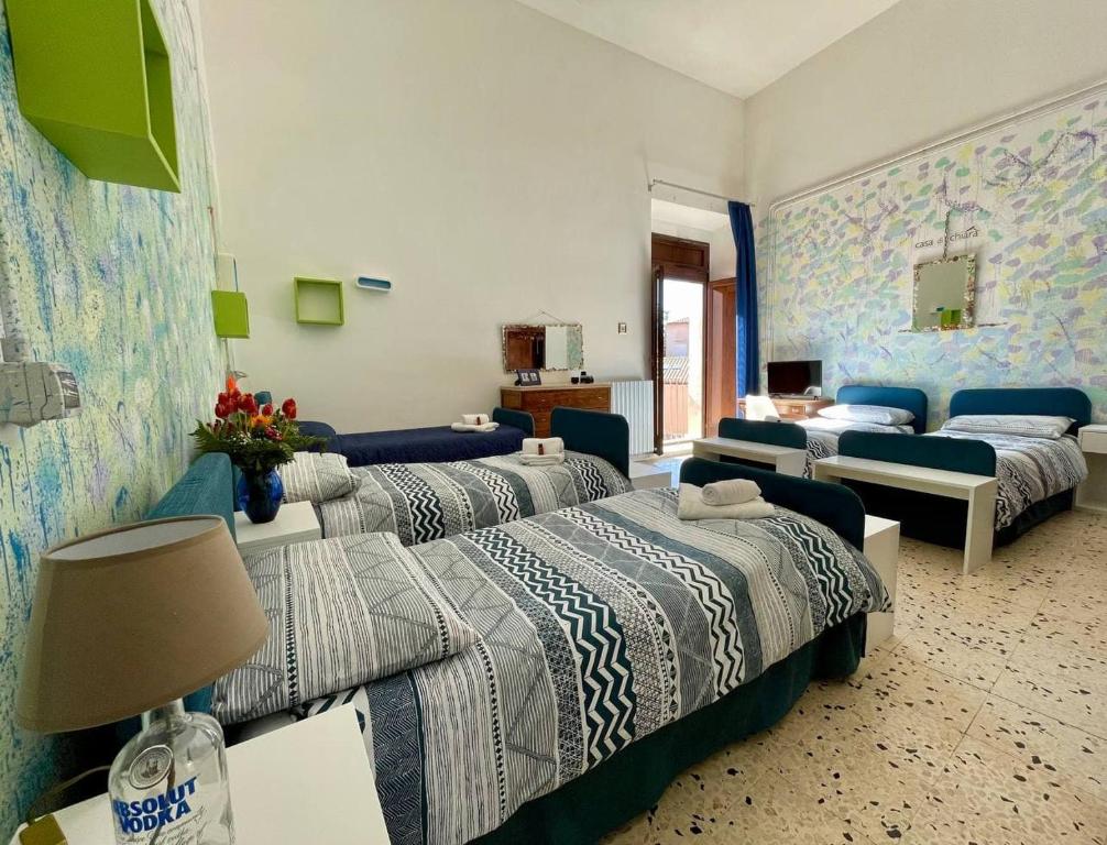 Letto o letti in una camera di Casa di Chiara