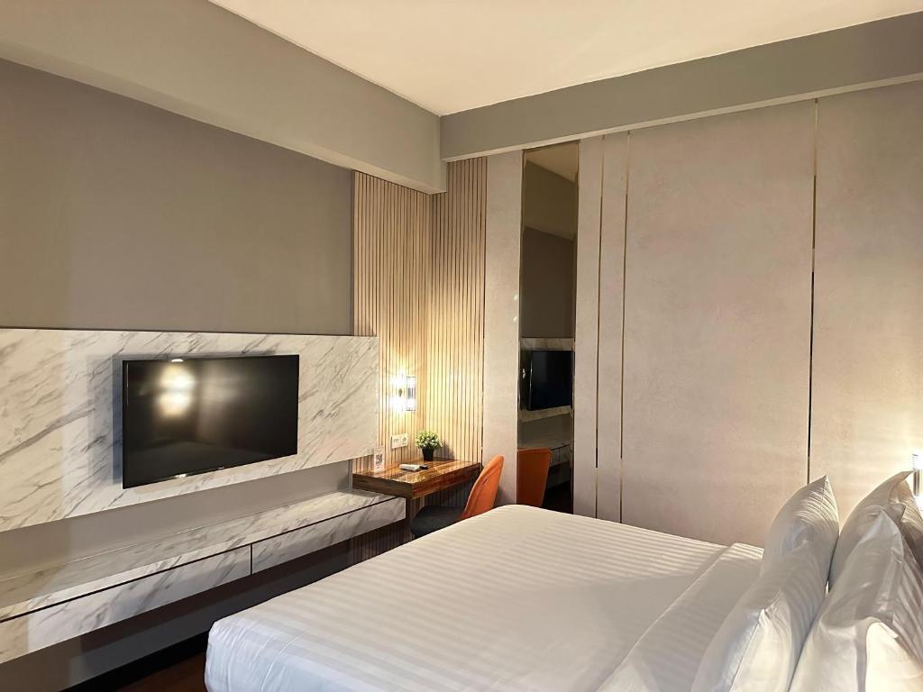 d'primahotel Jemursari Surabaya - Комната короля