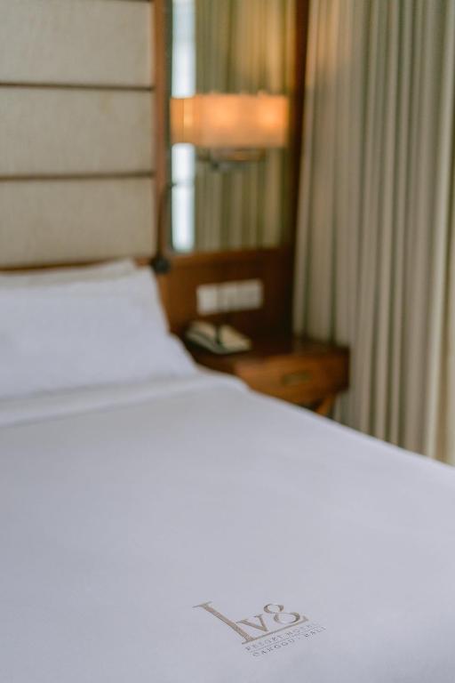 Postel nebo postele na pokoji v ubytování Lv8 Resort Hotel