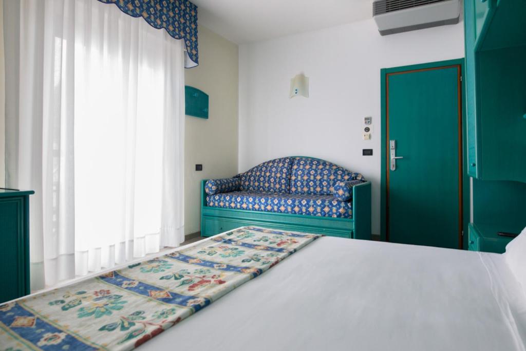Postel nebo postele na pokoji v ubytování Hotel Brioni Mare