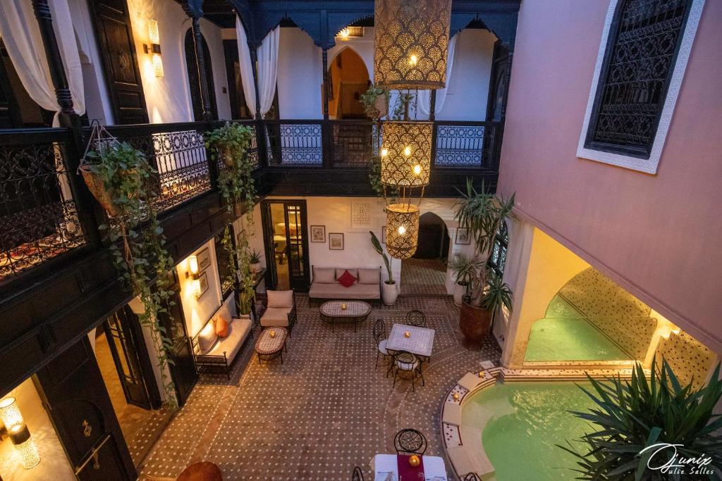 an overhead view of a building with a pool at Riad Zoraida in Marrakech