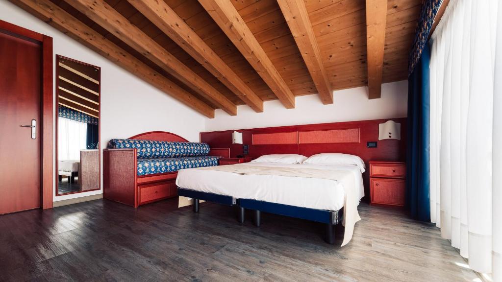 Postel nebo postele na pokoji v ubytování Hotel Brioni Mare
