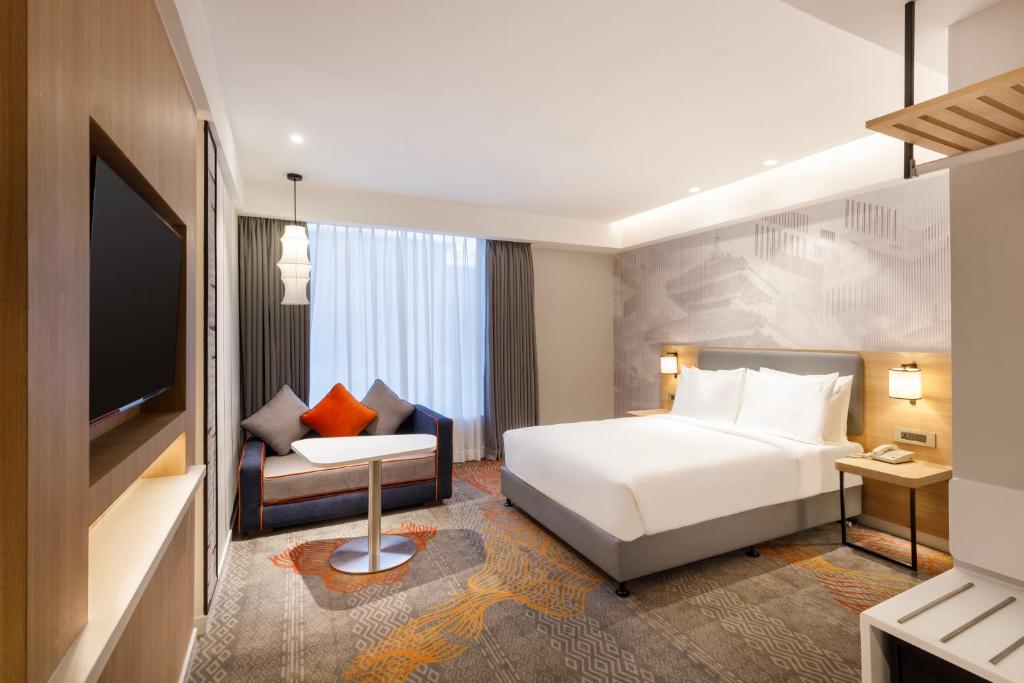 Postel nebo postele na pokoji v ubytování Holiday Inn Express Kathmandu Naxal by IHG