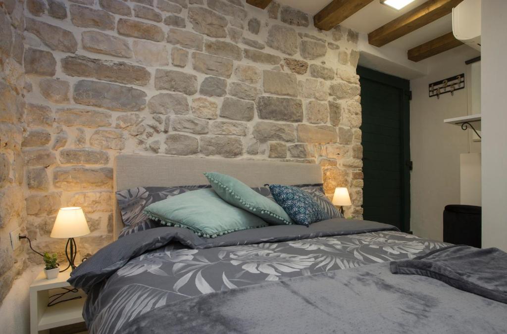 Posteľ alebo postele v izbe v ubytovaní Old Center Cozy Room