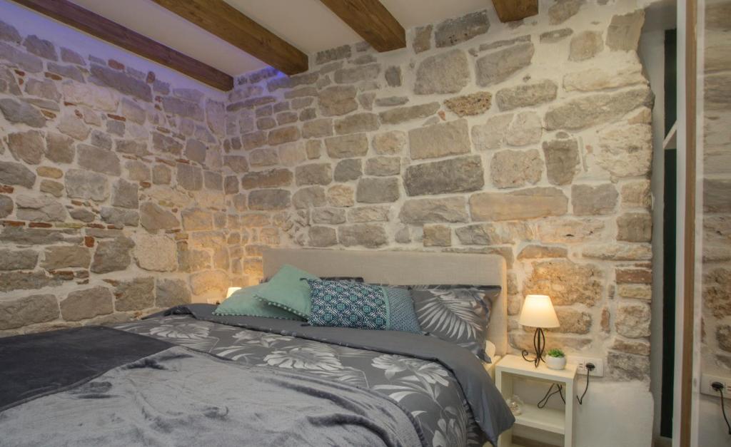 Posteľ alebo postele v izbe v ubytovaní Old Center Cozy Room