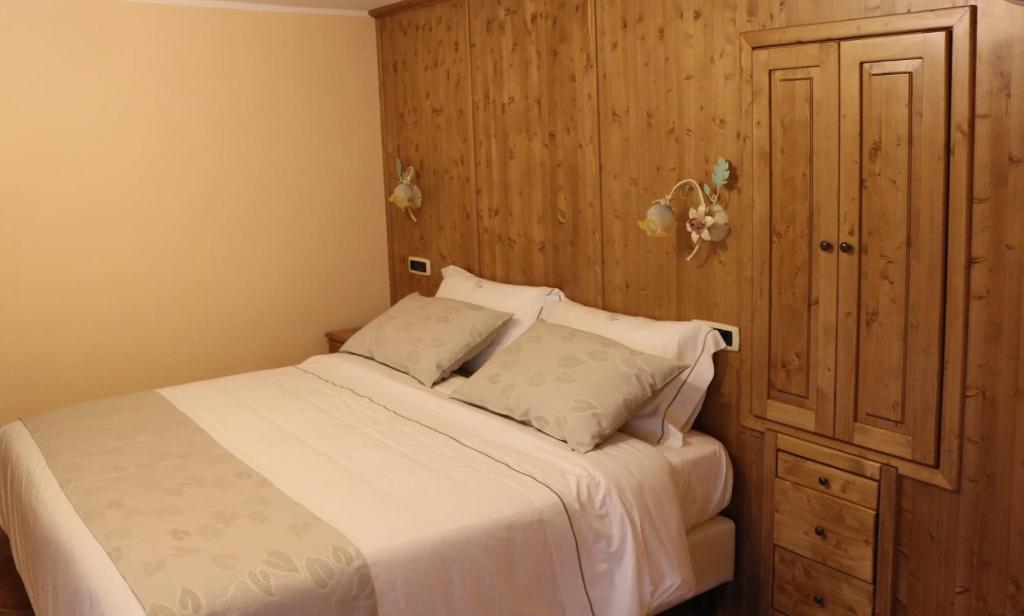 Postel nebo postele na pokoji v ubytování Dimora Storica Hotel Maccarunera