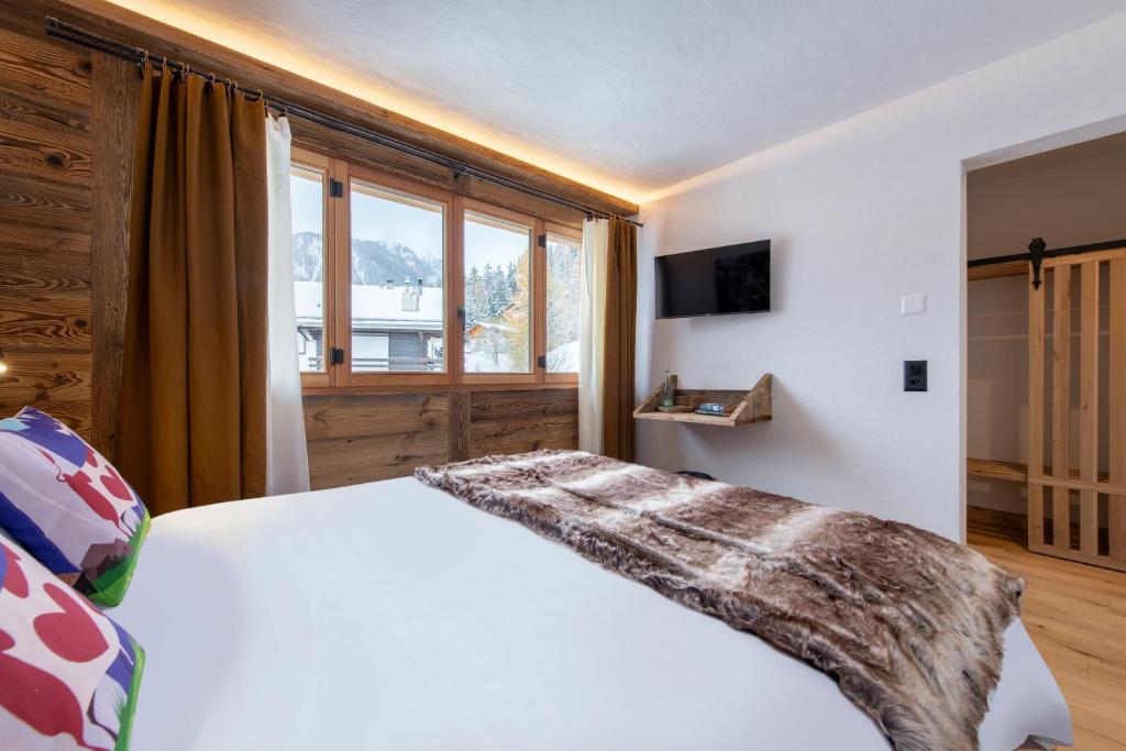 Postel nebo postele na pokoji v ubytování PAPILL'ON - Boutique Hotel