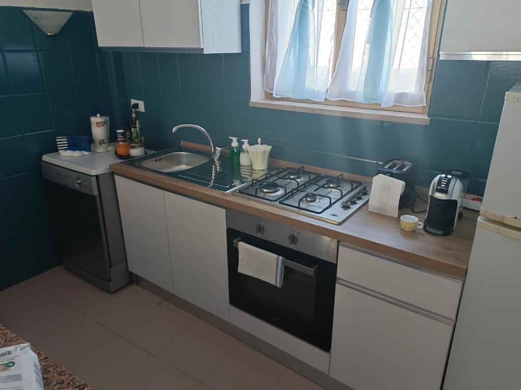 Kuchnia lub aneks kuchenny w obiekcie Country House Gaeta
