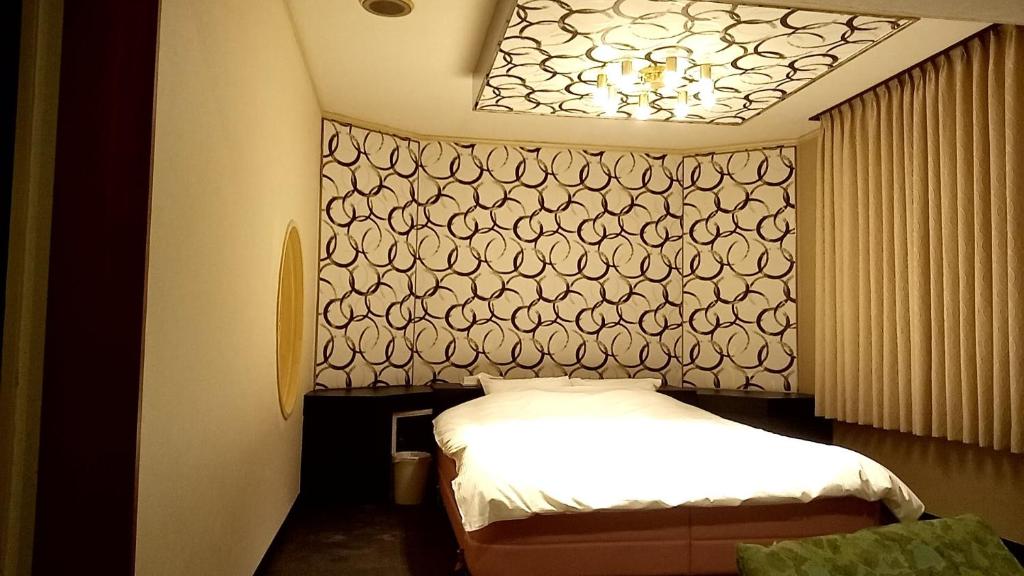 Posteľ alebo postele v izbe v ubytovaní HOTEL Z23