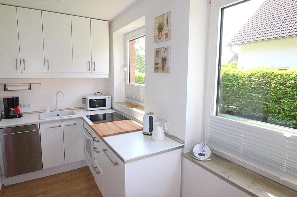 Kuchyň nebo kuchyňský kout v ubytování Apartmentvermittlung Mehr als Meer - Objekt 11