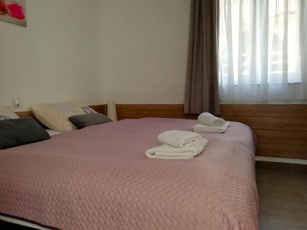 Posteľ alebo postele v izbe v ubytovaní Apartman Radošić