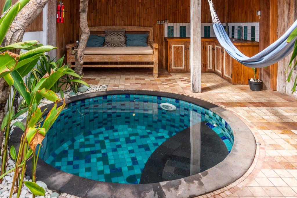 Bazén v ubytování Jawa House Private Villas nebo v jeho okolí