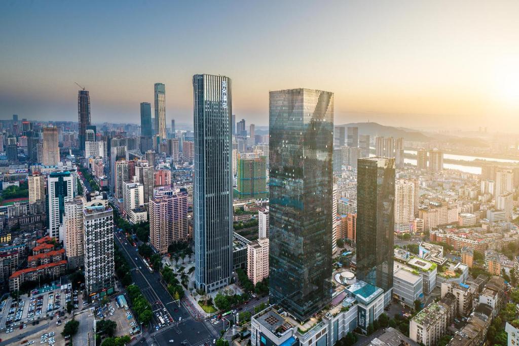 an aerial view of a city with tall skyscrapers at Atour Hotel Furong Middle Road Changsha in Changsha