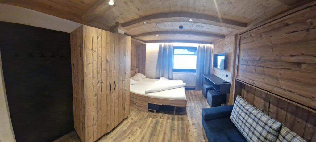 Hotel Garni Romantikにあるベッド