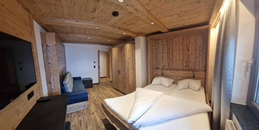 Hotel Garni Romantikにあるベッド