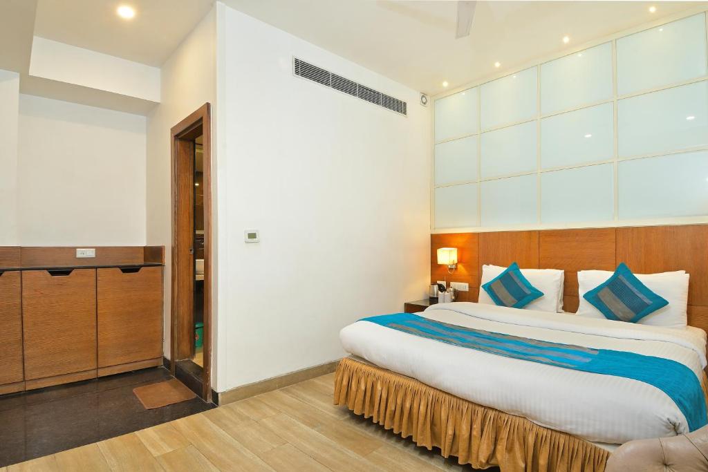 Postel nebo postele na pokoji v ubytování Hotel Hari Piorko - New Delhi Railway Station