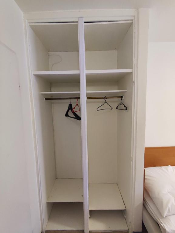 Postel nebo postele na pokoji v ubytování Jantar Economy