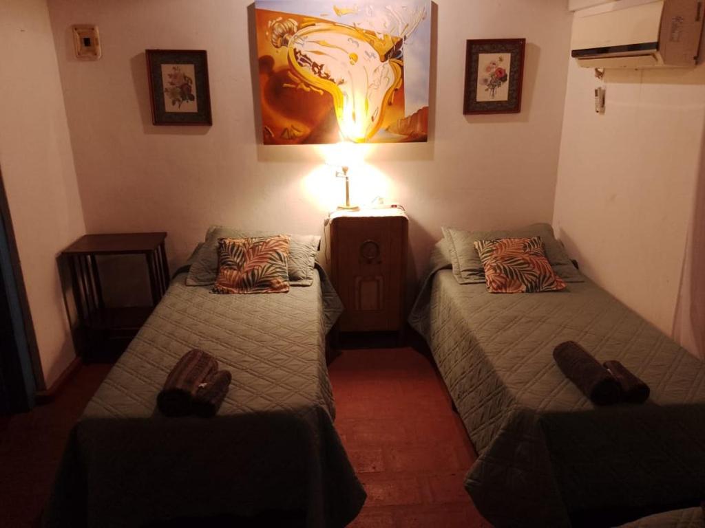 Postel nebo postele na pokoji v ubytování Hotel Posada El Recodo