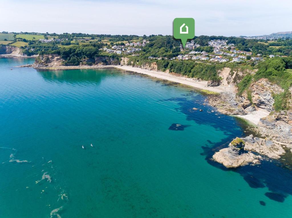 an aerial view of a beach next to the water at 3 Bed in Charlestown 65572 in Charlestown